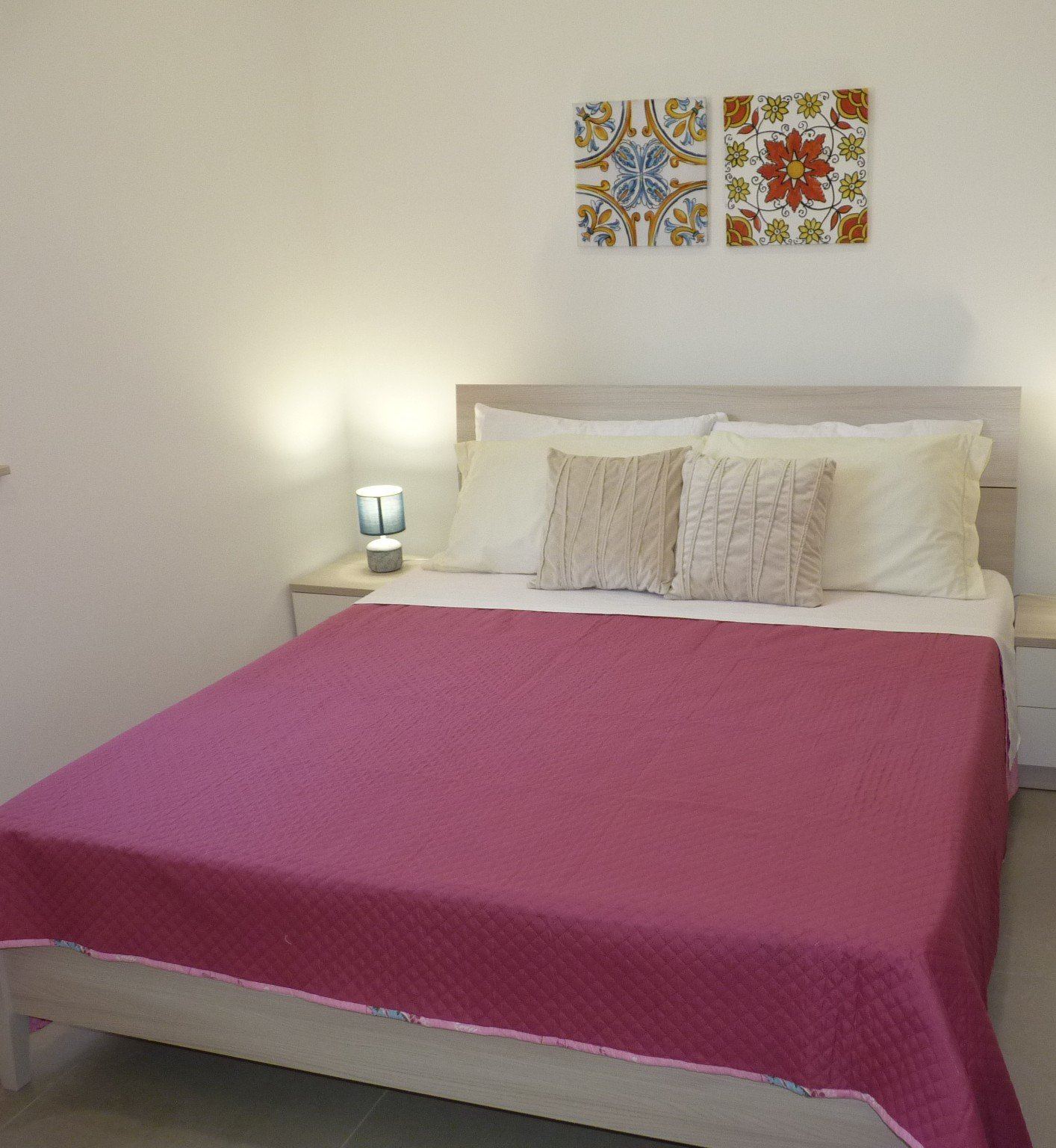 Spacious air-conditioned bedroom with comfortable double bed