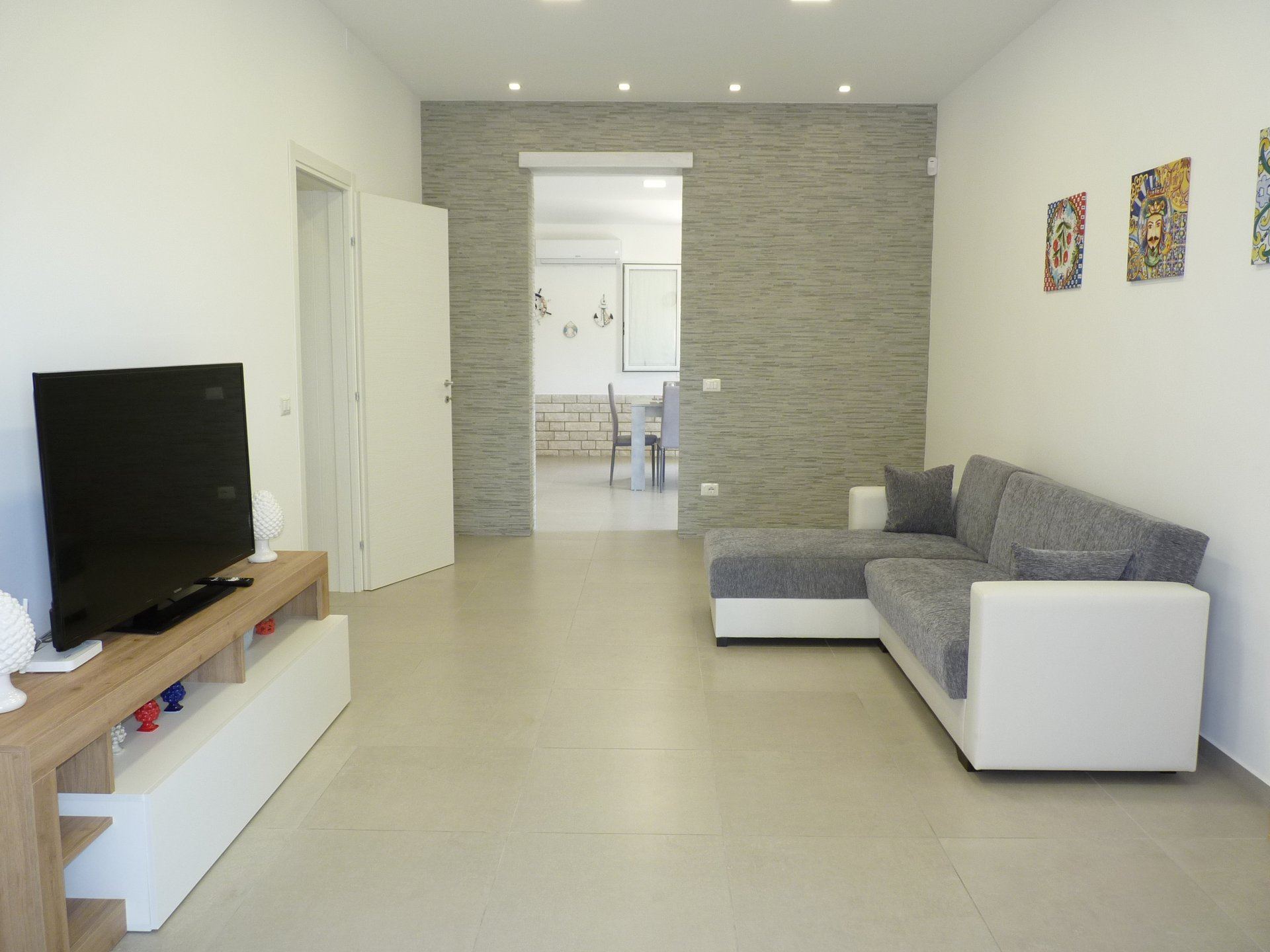 Spacious air-conditioned bedroom with comfortable double bed