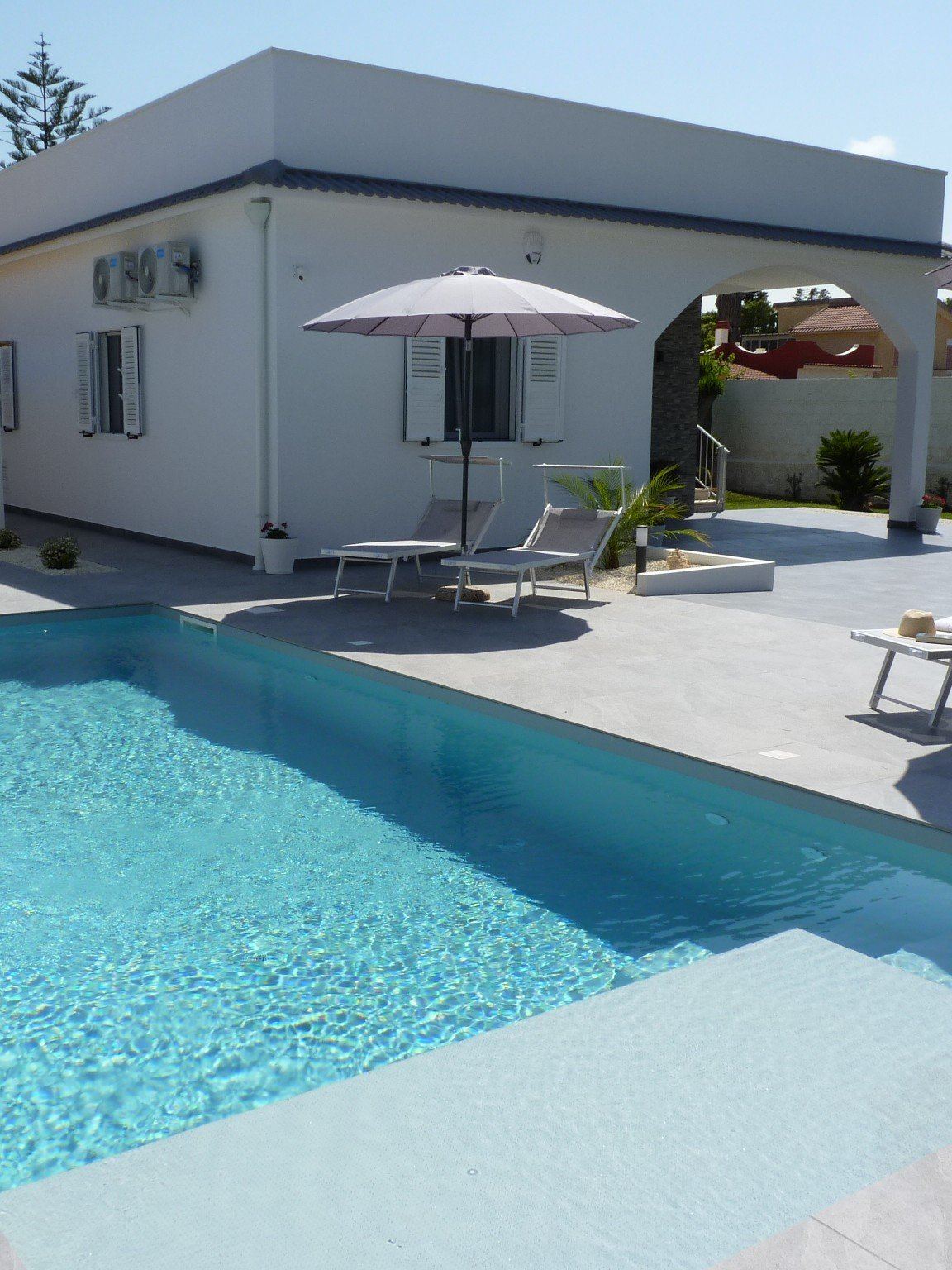 Villa Siciliu exterior with Mediterranean garden